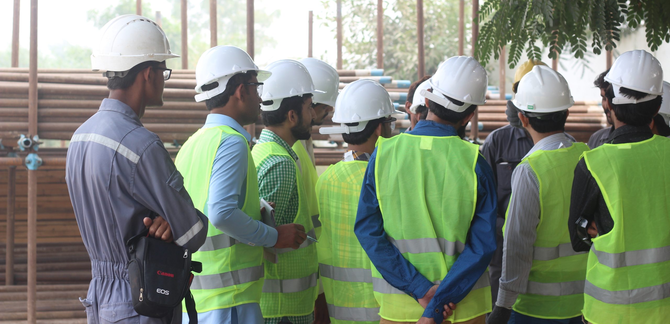 Environmental and HSE professionals participating in practical field learning