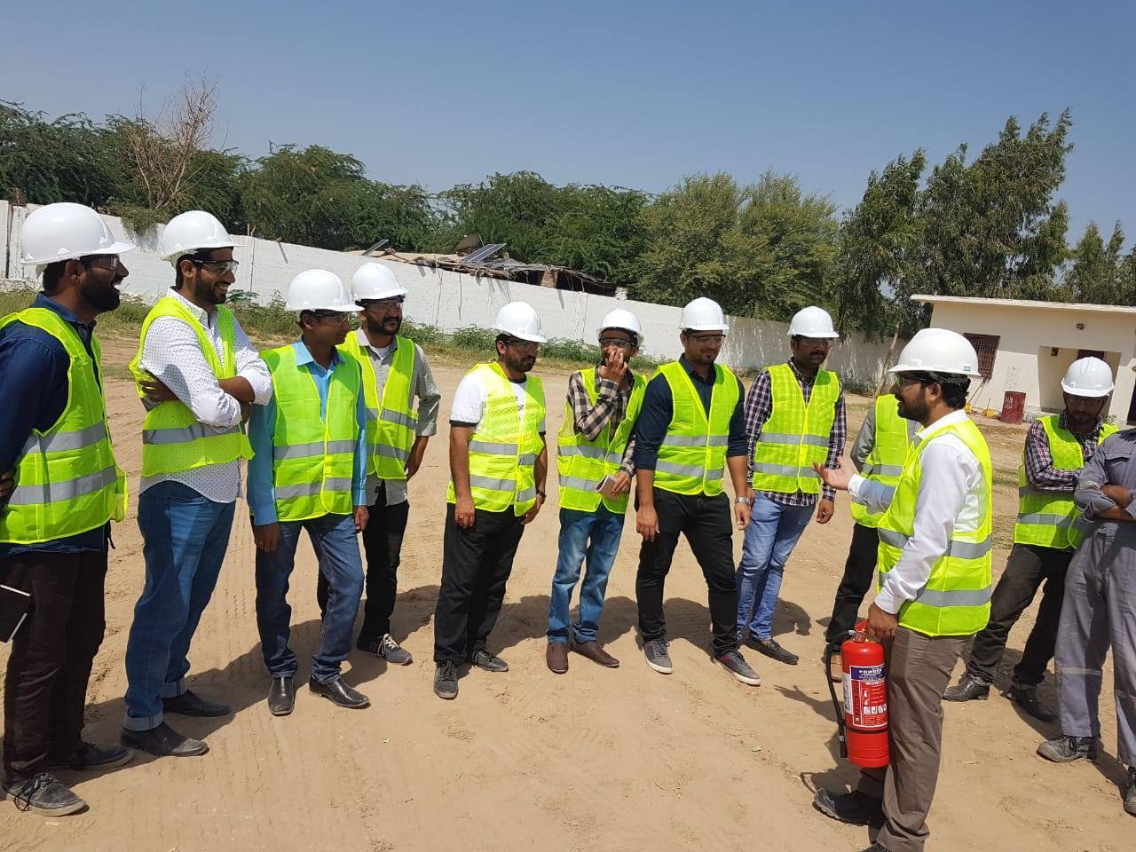 Managers and supervisors participating in practical workplace safety training