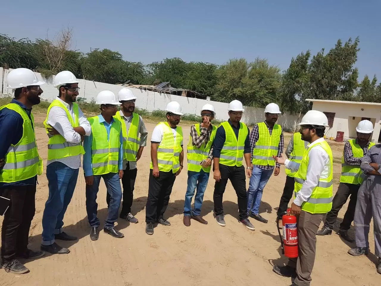 Managers and supervisors participating in practical workplace safety training